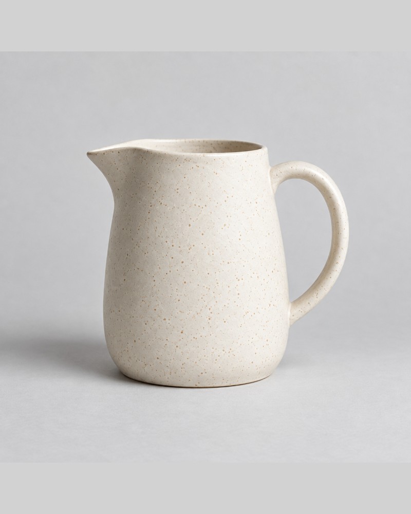 Whole pitcher photograph contained in a portrait canvas with gray space above and below